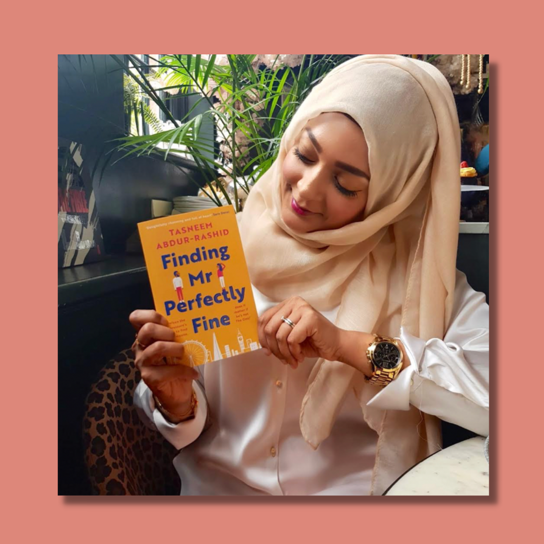 muslim woman holding a book