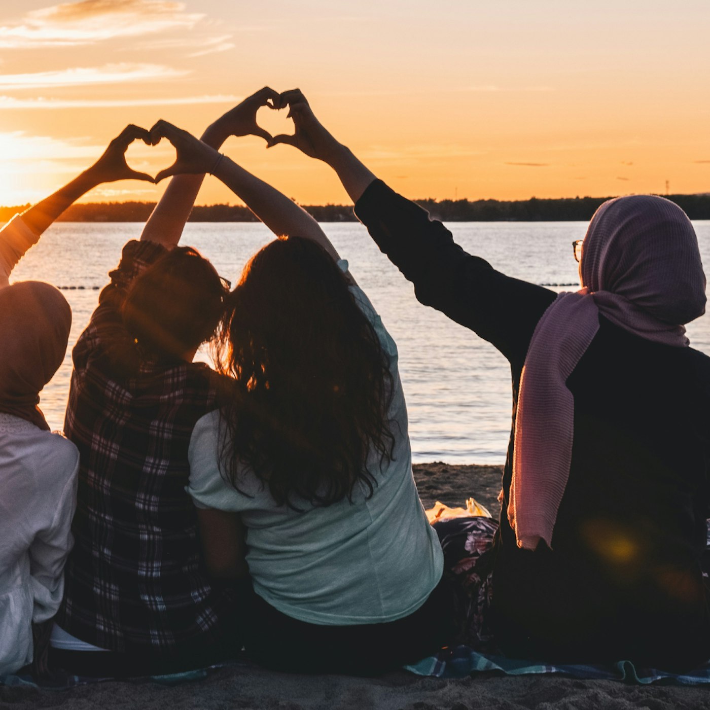 muslim women friends in sunset
