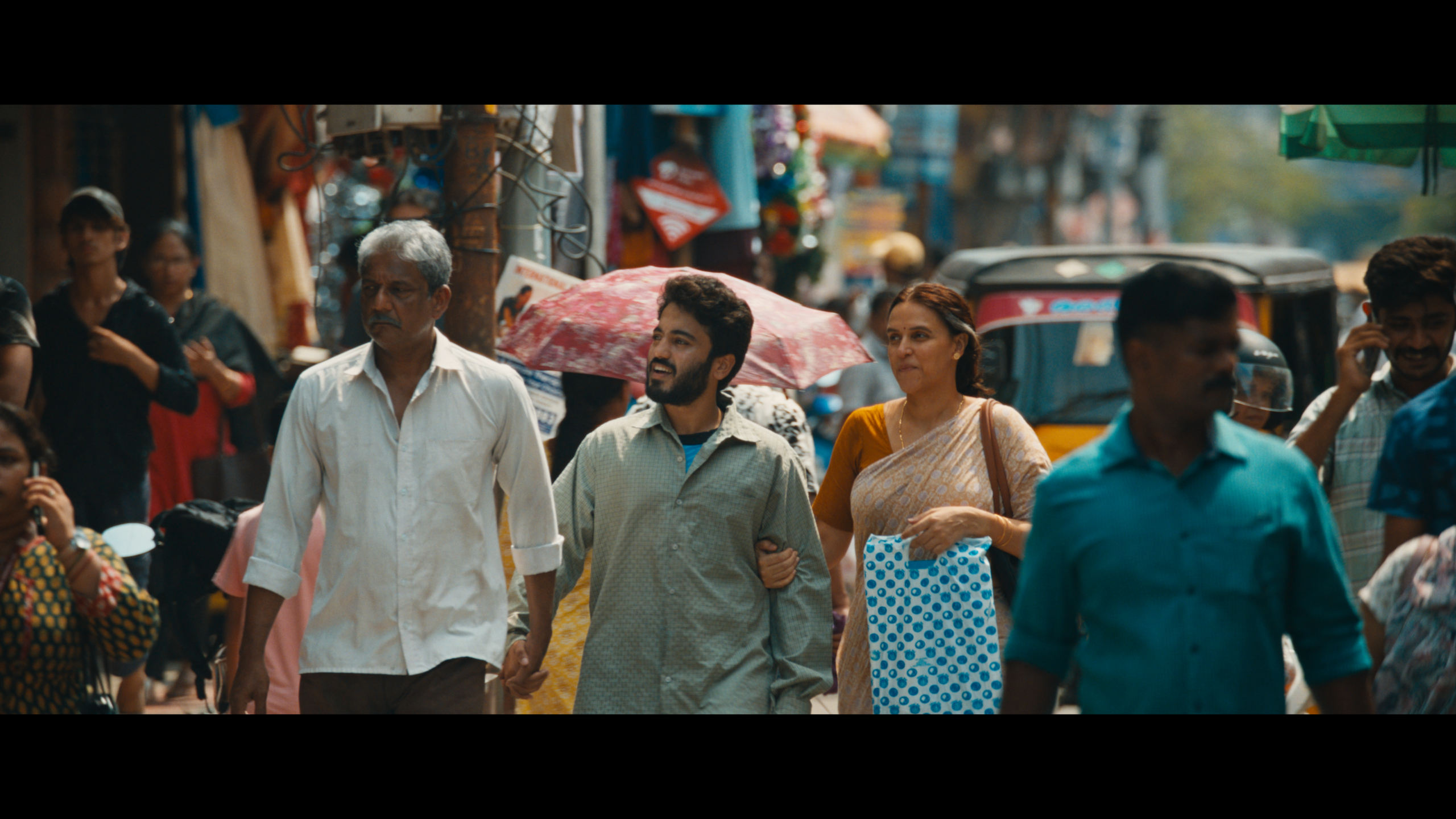 Adil Hussain, Yadav Shashidhar and Neha Dhupia in a still from film 52 Blue