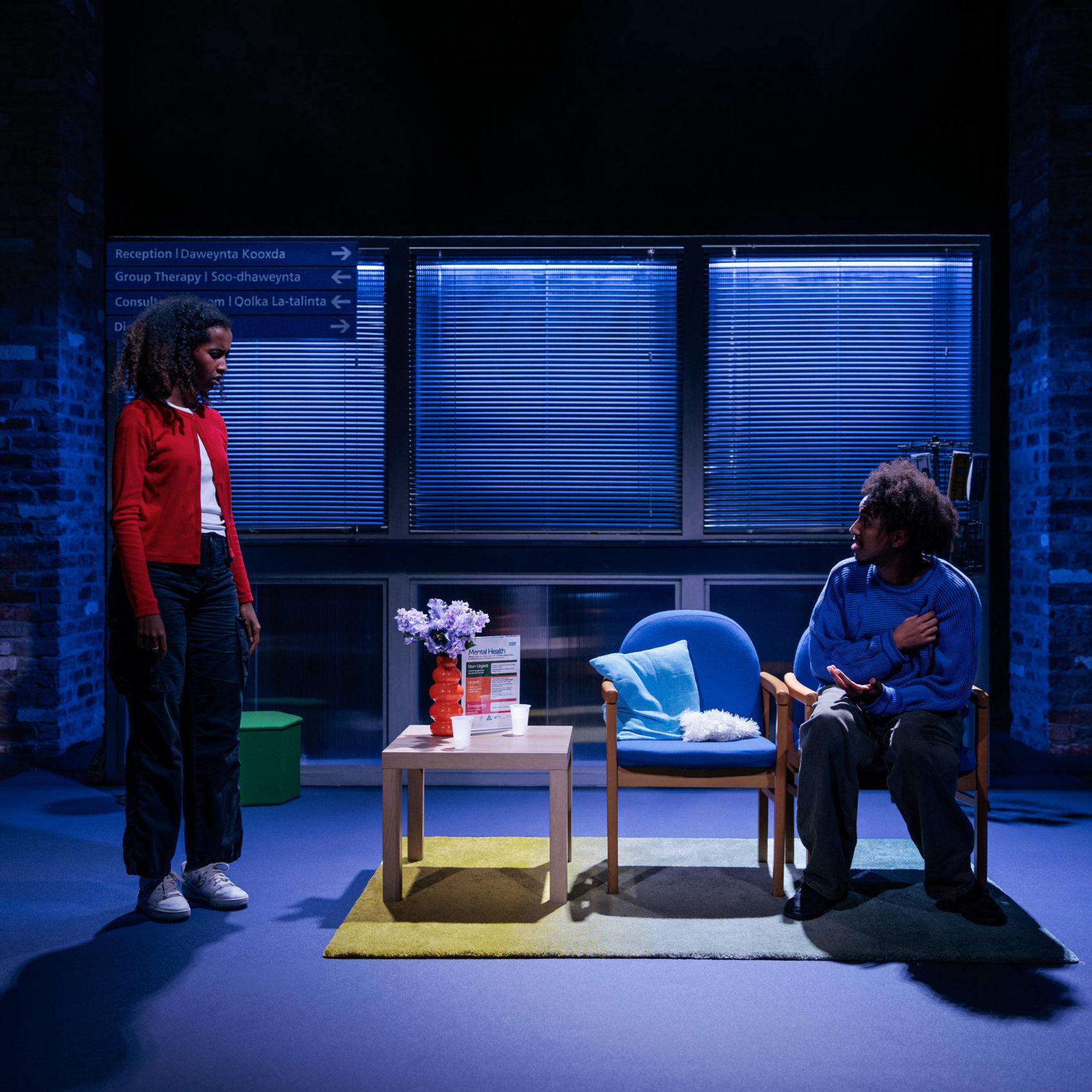 British-Somali actors Hadsan Mohamud and Mohamed Hashi on stage playing characters Najma and Zakaria respectively for their theatre play Crush