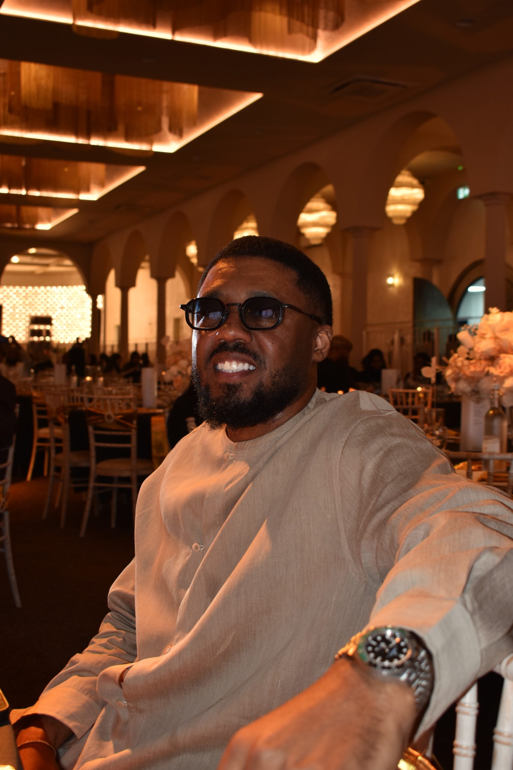 Image of Muslim Belal sitting at a table attending the Black Muslim Awards 2026 UK