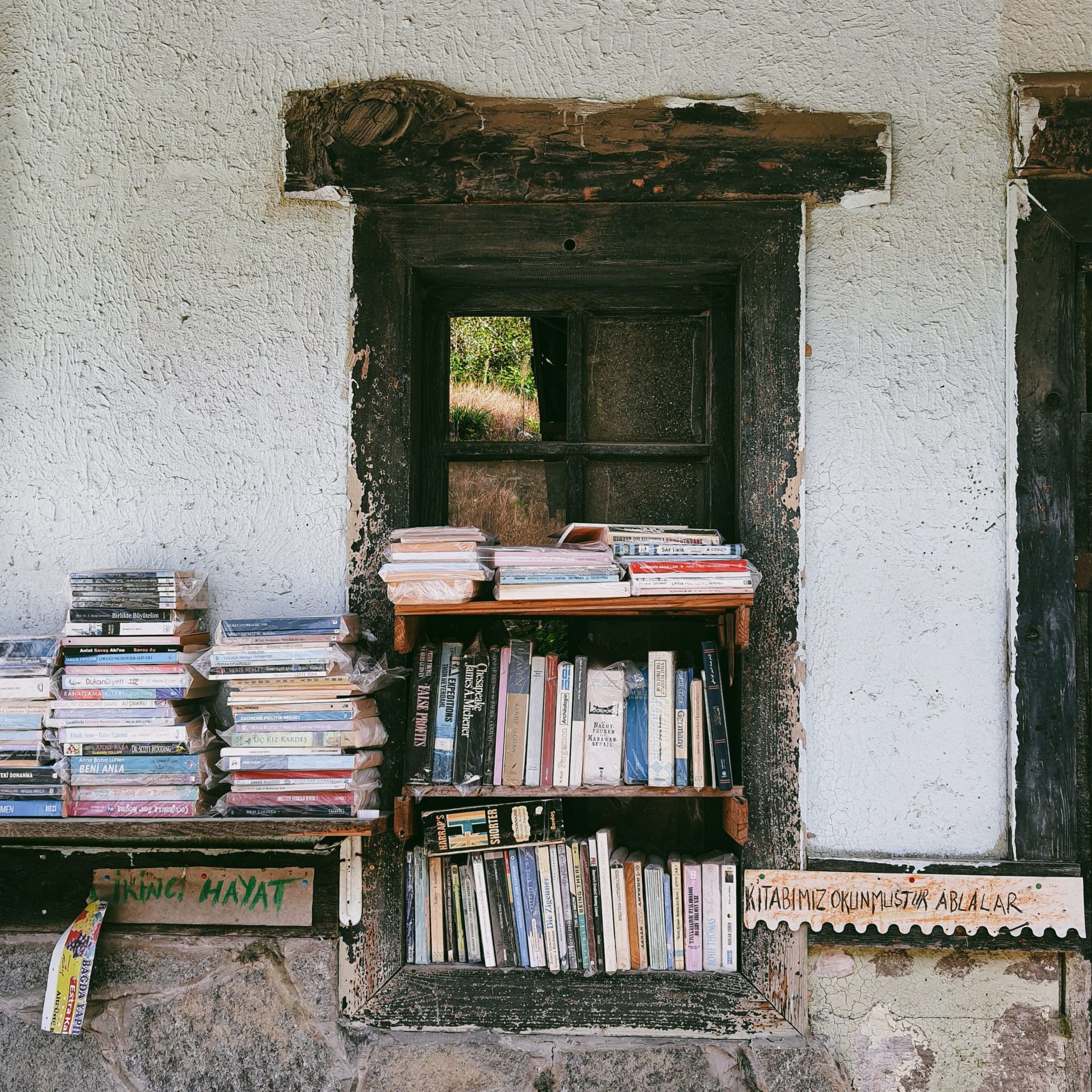 non-western classic books set in vintage style window in a turkish bookstore